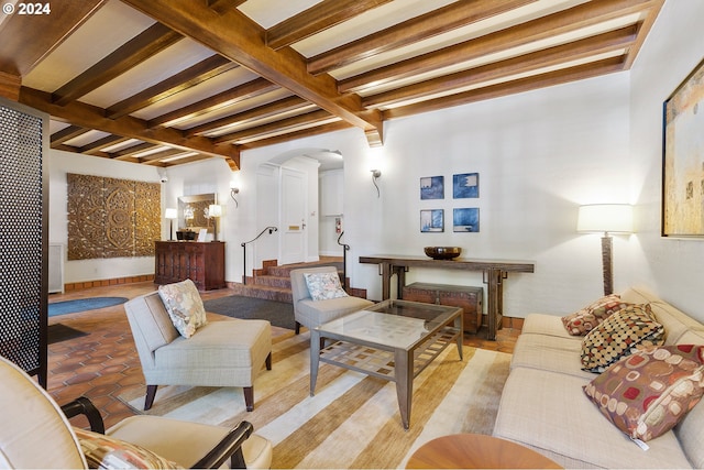 living room with beam ceiling and light hardwood / wood-style flooring