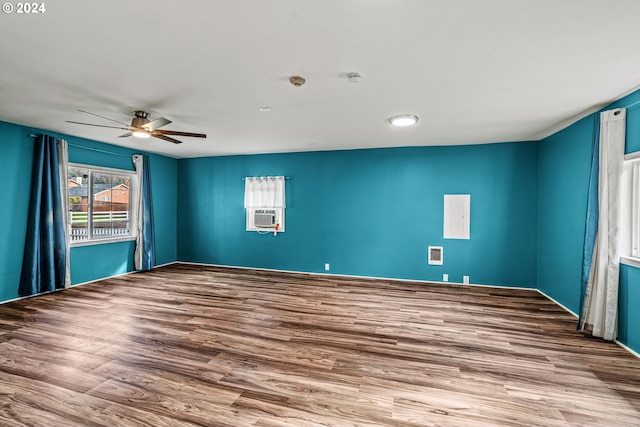 unfurnished room featuring hardwood / wood-style floors and ceiling fan