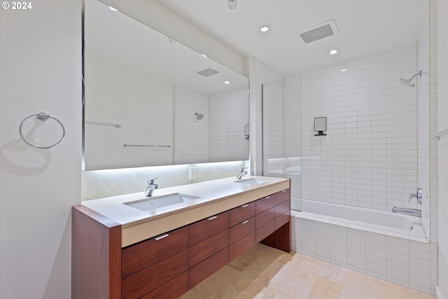 3570 S River Pkwy Unit 1609, Portland, OR 97239 - bathroom with double vanity, tiled shower / bath combo, recessed lighting, and tile patterned floors