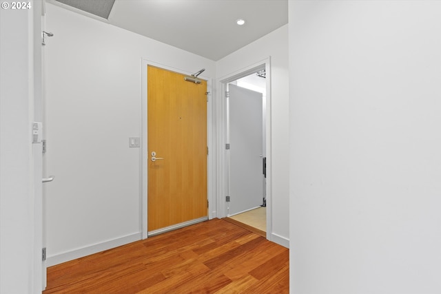 3570 S River Pkwy Unit 1609, Portland, OR 97239 - hallway featuring light wood-type flooring and recessed lighting