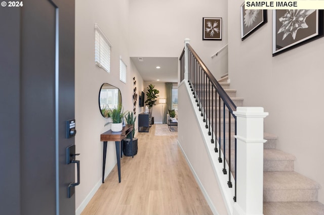 entrance foyer featuring light wood-type flooring