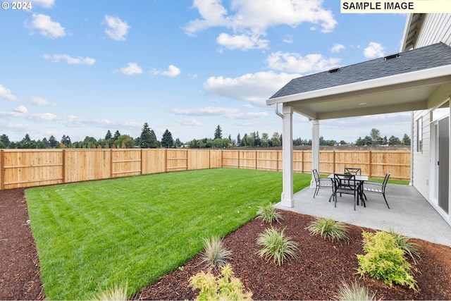 view of yard with a patio