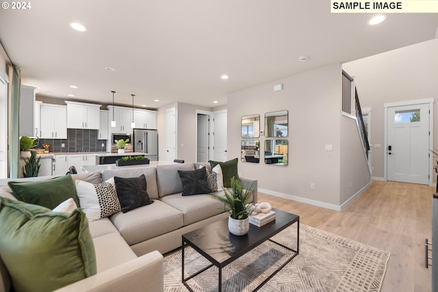 living room with light hardwood / wood-style floors