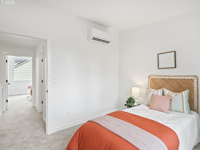 carpeted bedroom featuring a wall unit AC