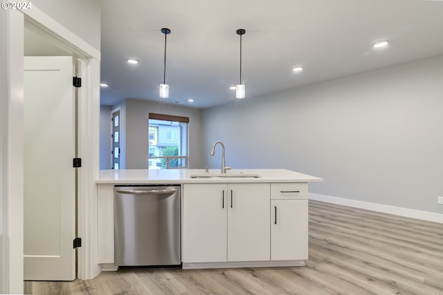 kitchen with dishwasher, light hardwood / wood-style floors, white cabinetry, and sink