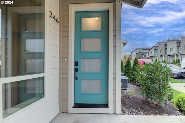 property entrance with cooling unit