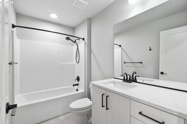 full bathroom with vanity, tile patterned flooring, tub / shower combination, and toilet