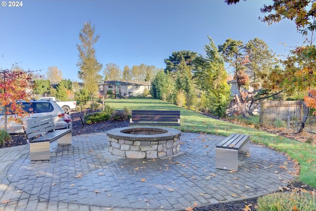 view of patio / terrace featuring a fire pit