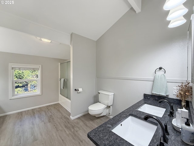 full bathroom featuring wood-type flooring, toilet, lofted ceiling with beams, combined bath / shower with glass door, and vanity