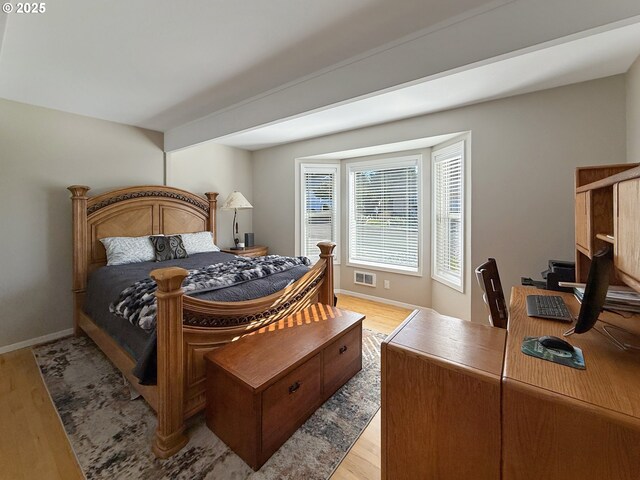 bedroom featuring light hardwood / wood-style floors