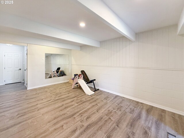 basement with wood-type flooring