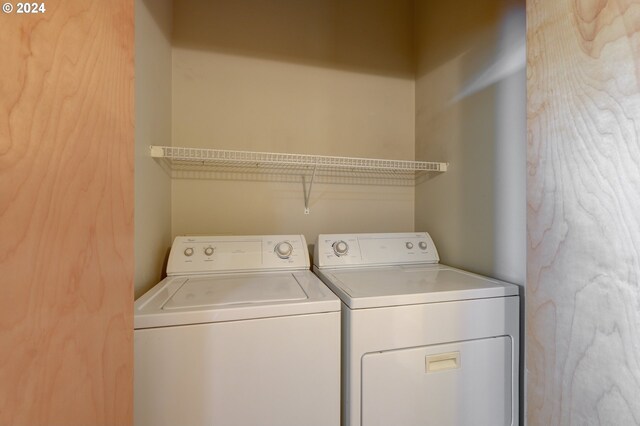 1125 NW 9th Ave Unit 524, Portland, OR 97209 - laundry room featuring washer and dryer