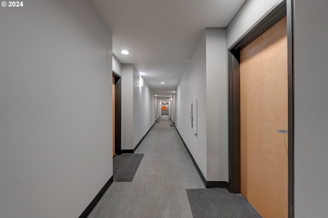 1125 NW 9th Ave Unit 524, Portland, OR 97209 - hallway featuring recessed lighting, carpet flooring, and baseboards