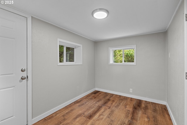 512 4th St, Myrtle Point, OR 97458 - unfurnished room featuring wood finished floors and baseboards