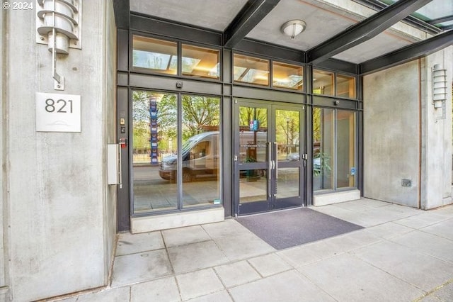 doorway to property featuring french doors