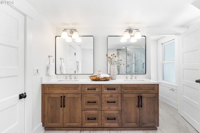 bathroom featuring dual vanity, a notable chandelier, and tile floors