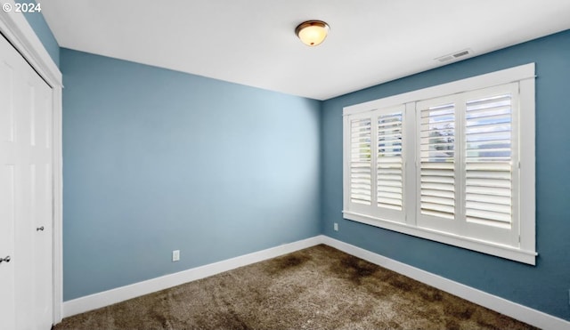 view of carpeted spare room