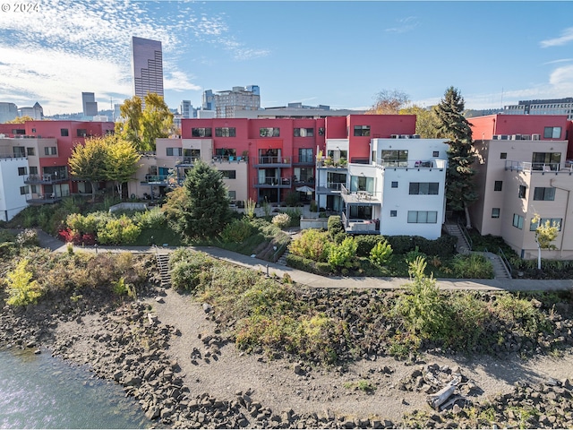 view of building exterior with a water view