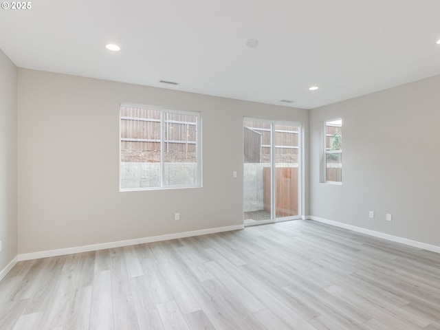 724 NW 178th Way, Ridgefield, WA 98642 - unfurnished bedroom with light wood-style flooring, baseboards, access to exterior, and recessed lighting