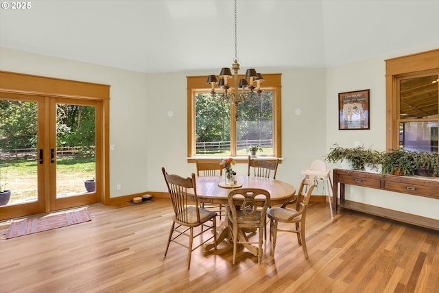 47266 SW Carpenter Creek Rd, Forest Grove, OR 97116 - dining area featuring a chandelier, light wood-style floors, and french doors