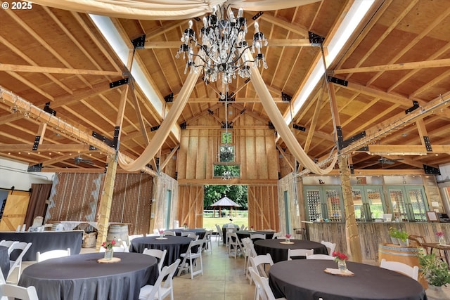 47266 SW Carpenter Creek Rd, Forest Grove, OR 97116 - dining room featuring high vaulted ceiling and a chandelier