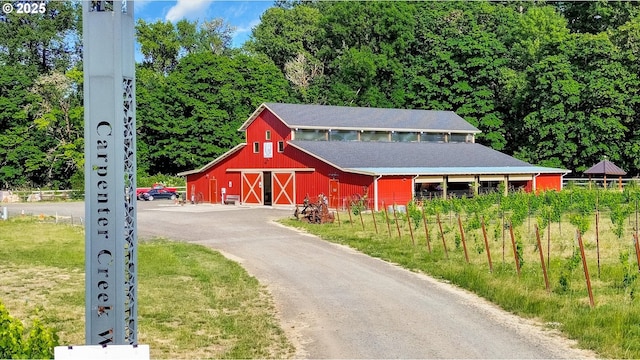 47266 SW Carpenter Creek Rd, Forest Grove, OR 97116 - view of front of home featuring a barn, an outdoor structure, and a garage