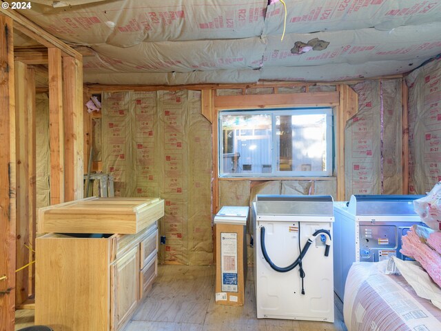 laundry area with plenty of natural light