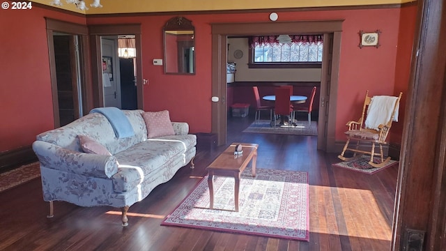 living room with dark wood-type flooring