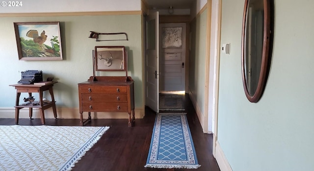 hallway featuring dark hardwood / wood-style floors