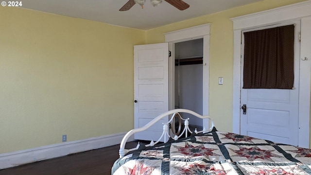 bedroom featuring dark hardwood / wood-style floors and ceiling fan