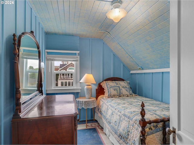 bedroom featuring lofted ceiling