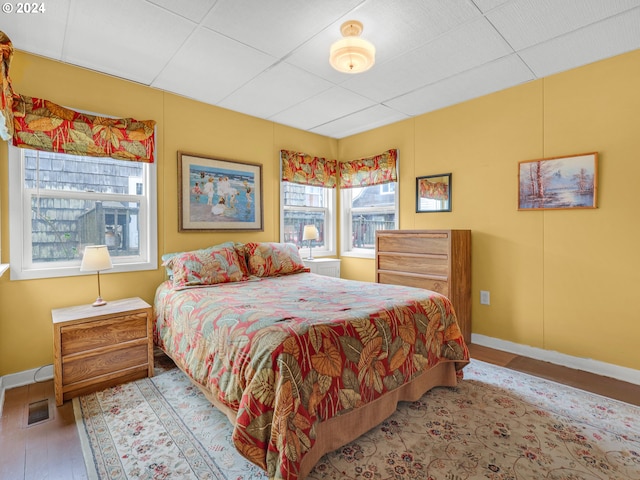 bedroom with light hardwood / wood-style flooring