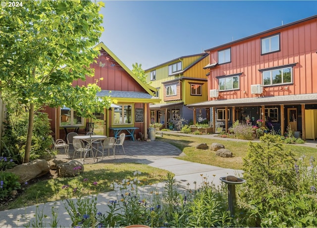 rear view of property with a patio area