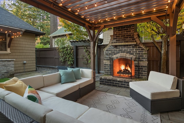 view of patio / terrace with an outdoor living space with a fireplace