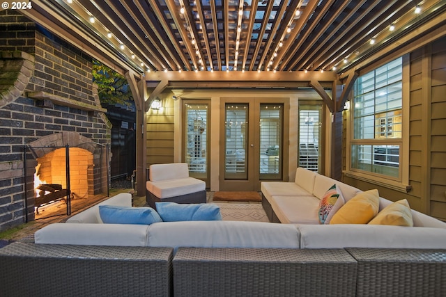 living room with brick wall and a brick fireplace