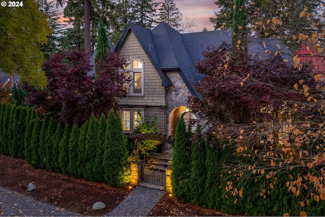 view of property hidden behind natural elements