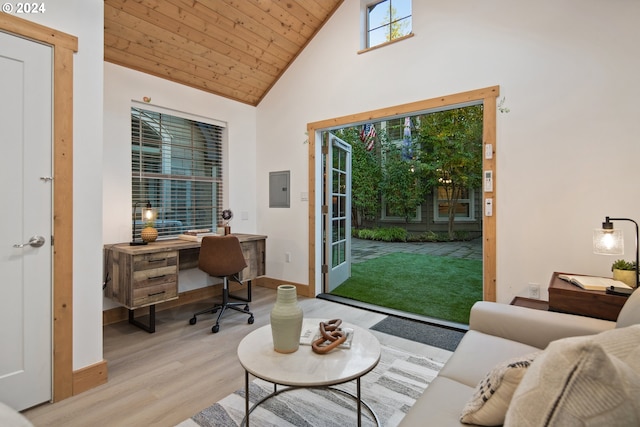 office space featuring wood ceiling, electric panel, high vaulted ceiling, and light hardwood / wood-style flooring