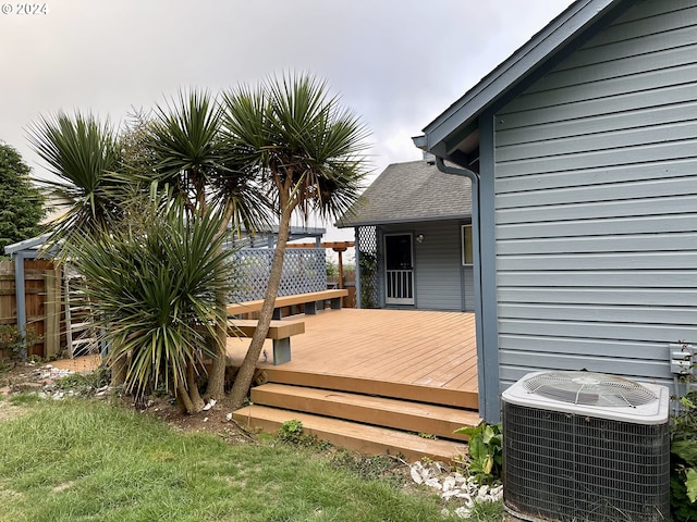 wooden terrace featuring central air condition unit