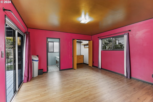 unfurnished room featuring light hardwood / wood-style floors