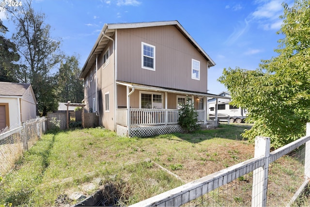 exterior space featuring a yard and a porch