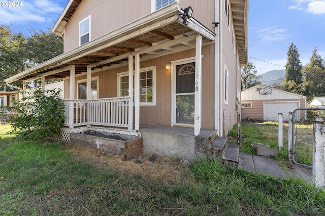 property entrance with covered porch