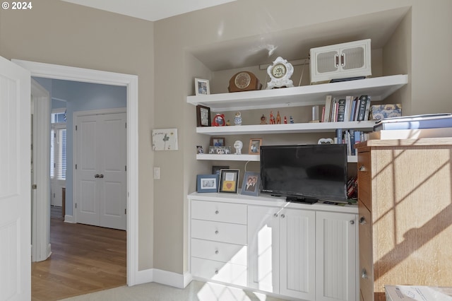 home office featuring wood-type flooring