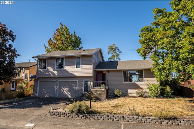 split level home with a garage