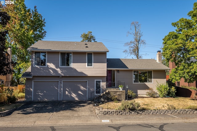 split level home with a garage