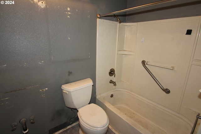 bathroom with toilet and shower / bath combination