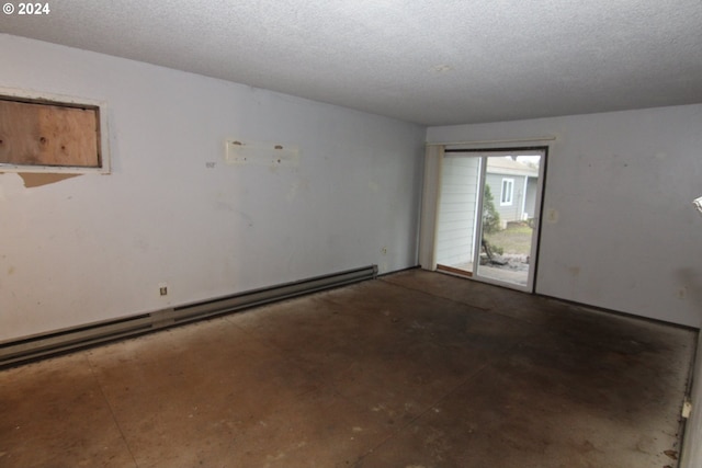 unfurnished room featuring a textured ceiling and baseboard heating