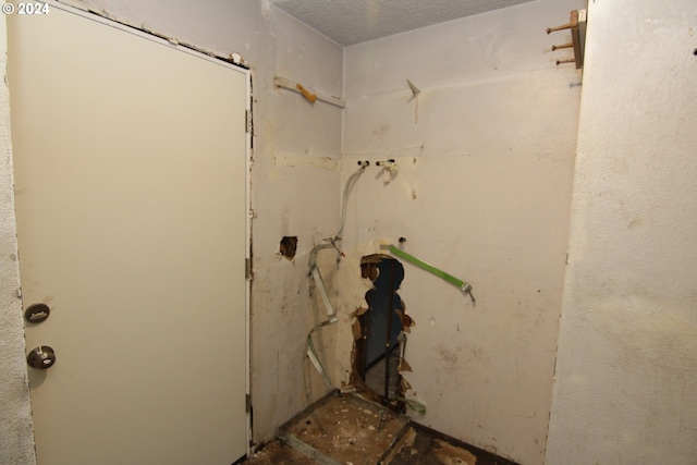 bathroom featuring a textured ceiling