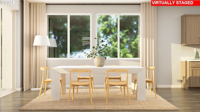 dining space with dark wood-type flooring