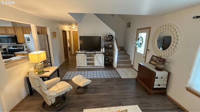 living room with dark hardwood / wood-style flooring