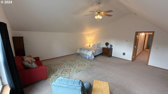 bedroom with light carpet, vaulted ceiling, and ceiling fan